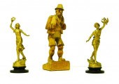 Three decorative carvings incl