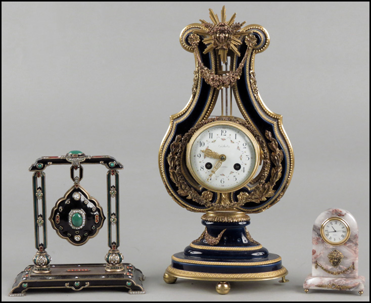 THREE DECORATIVE CLOCKS. One Jay