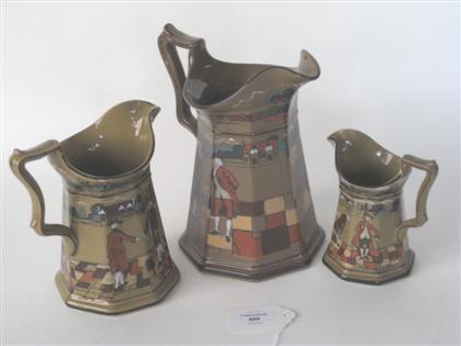 Three Deldare ware pottery pitchers