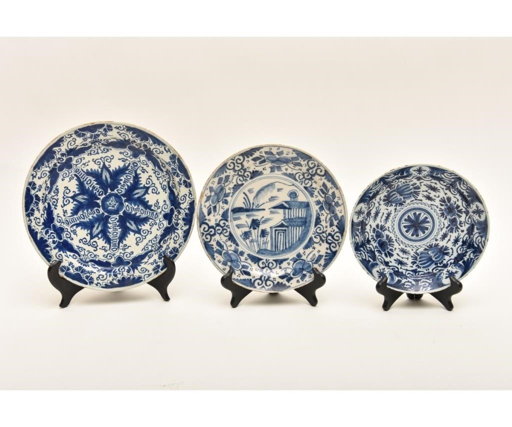 Three Delft plates, 18th c. Largest