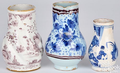 THREE DELFTWARE PITCHERS, MID