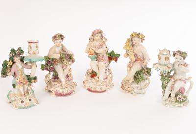 Three Derby figures of seated