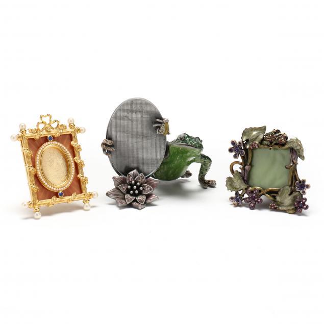 THREE DIMINUTIVE PHOTO FRAMES A