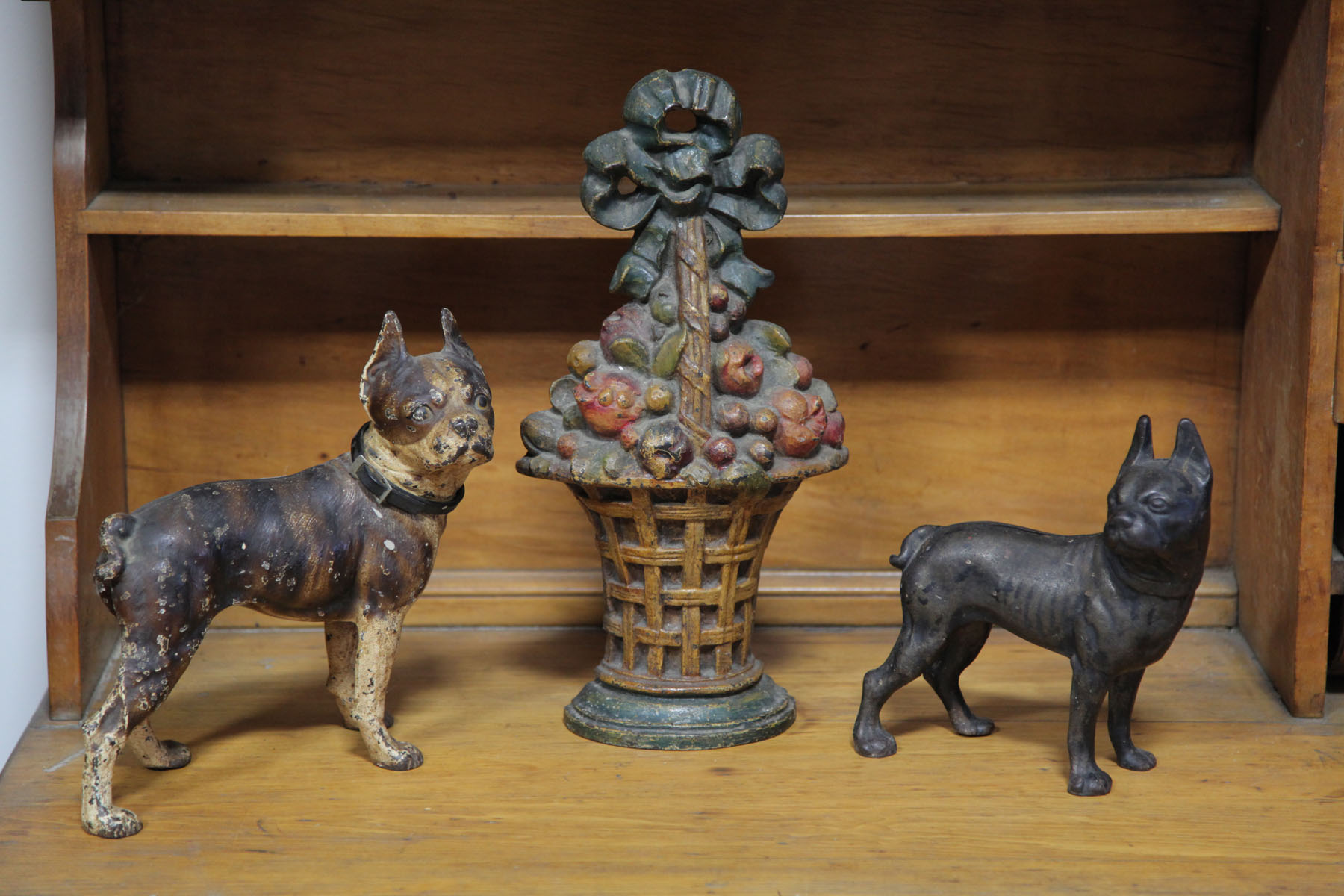 THREE DOOR STOPS.  American 