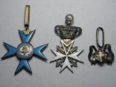 Three early brass medals. Firs
