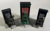 Three early Kodak folding bell