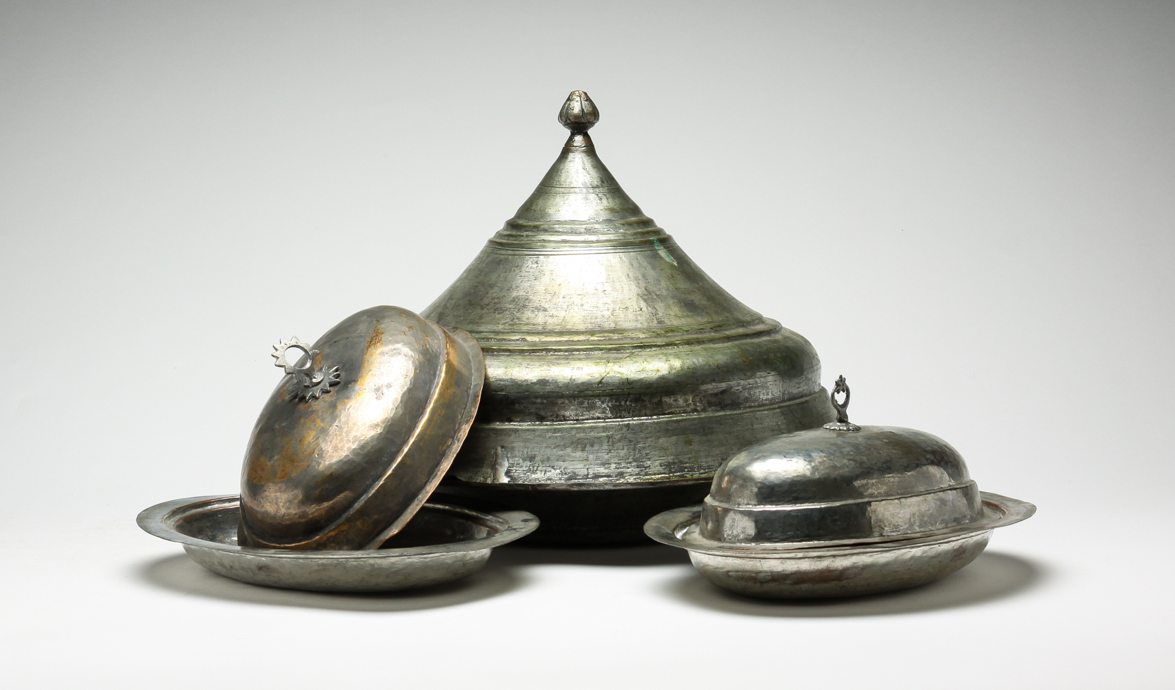 THREE EASTERN TINNED COPPER SERVING