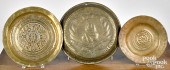 THREE EMBOSSED BRASS ALMS DISH
