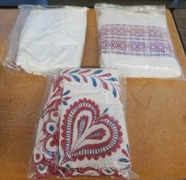 THREE EMBROIDERED CLOTH COVERS
