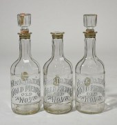 THREE ENAMELED JACK DANIELS DE