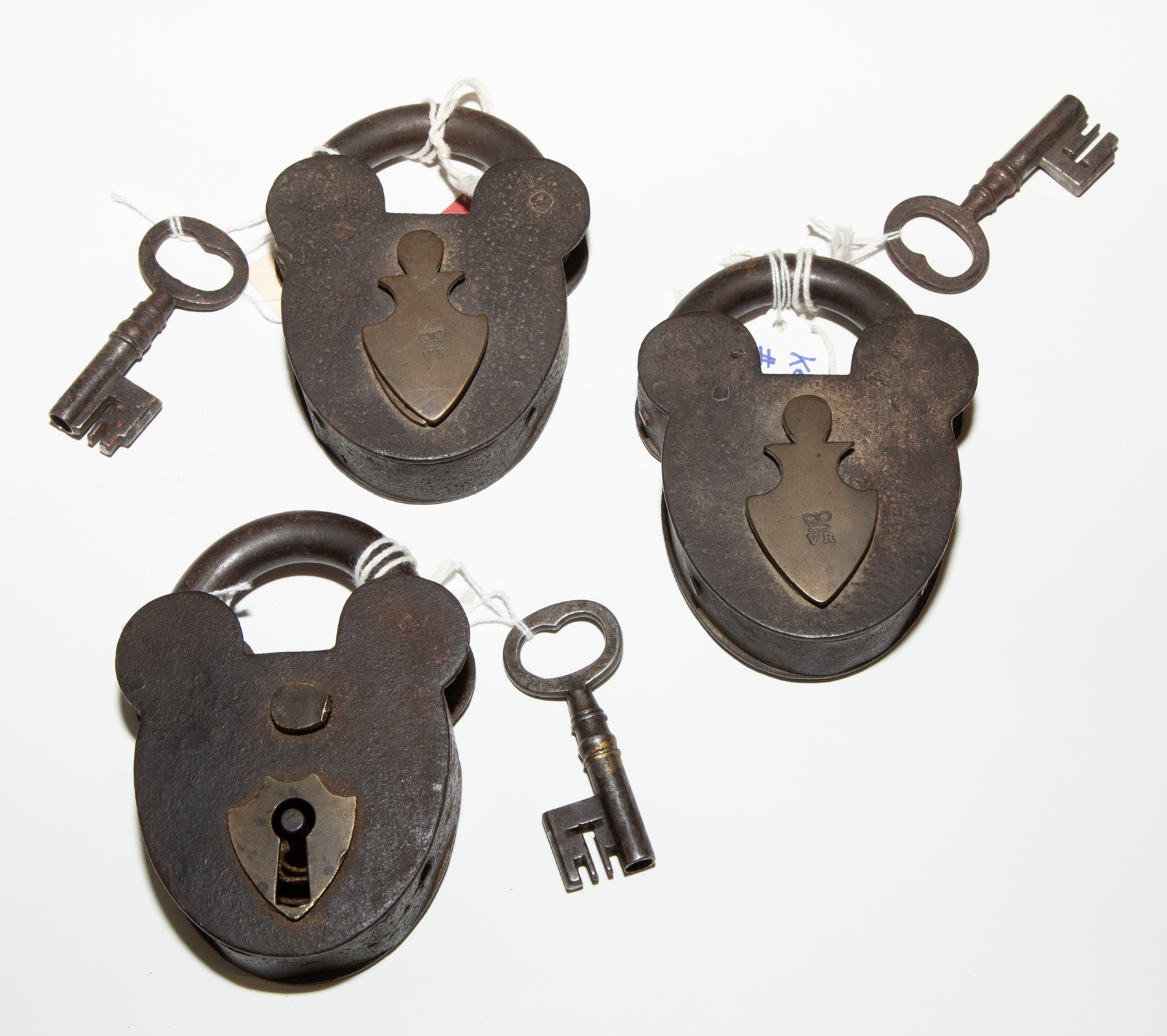 THREE ENGLISH IRON PADLOCKS WITH