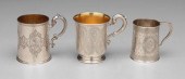 Three English silver mugs, all