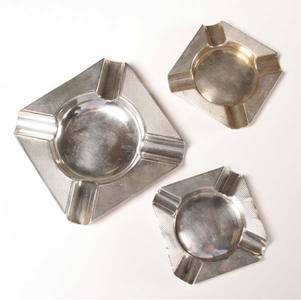 Three English sterling ashtrays;