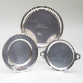 THREE ENGRAVED SILVER BOTTLE C