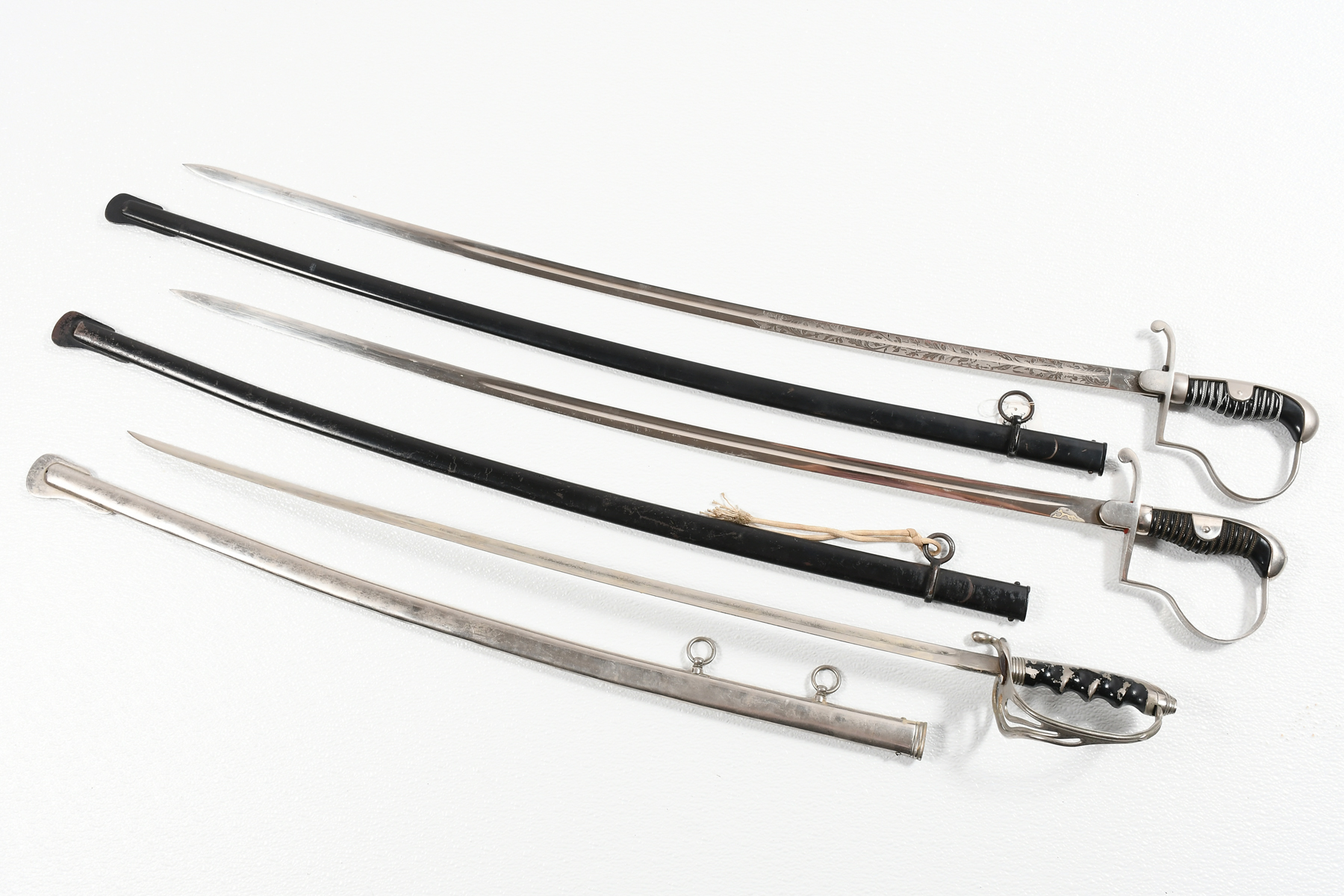 THREE EUROPEAN MADE SWORDS: (1)