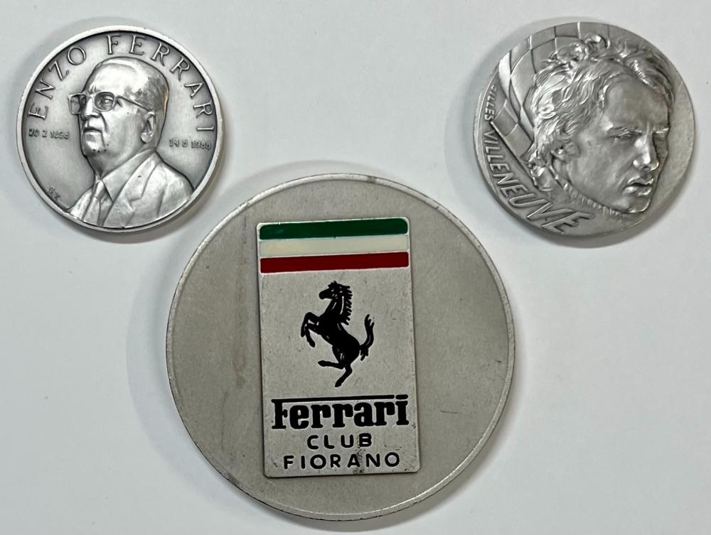 THREE FERRARI EVENT MEDALS, EACH IN