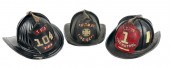 THREE FIRE HELMETS 19TH/20TH C