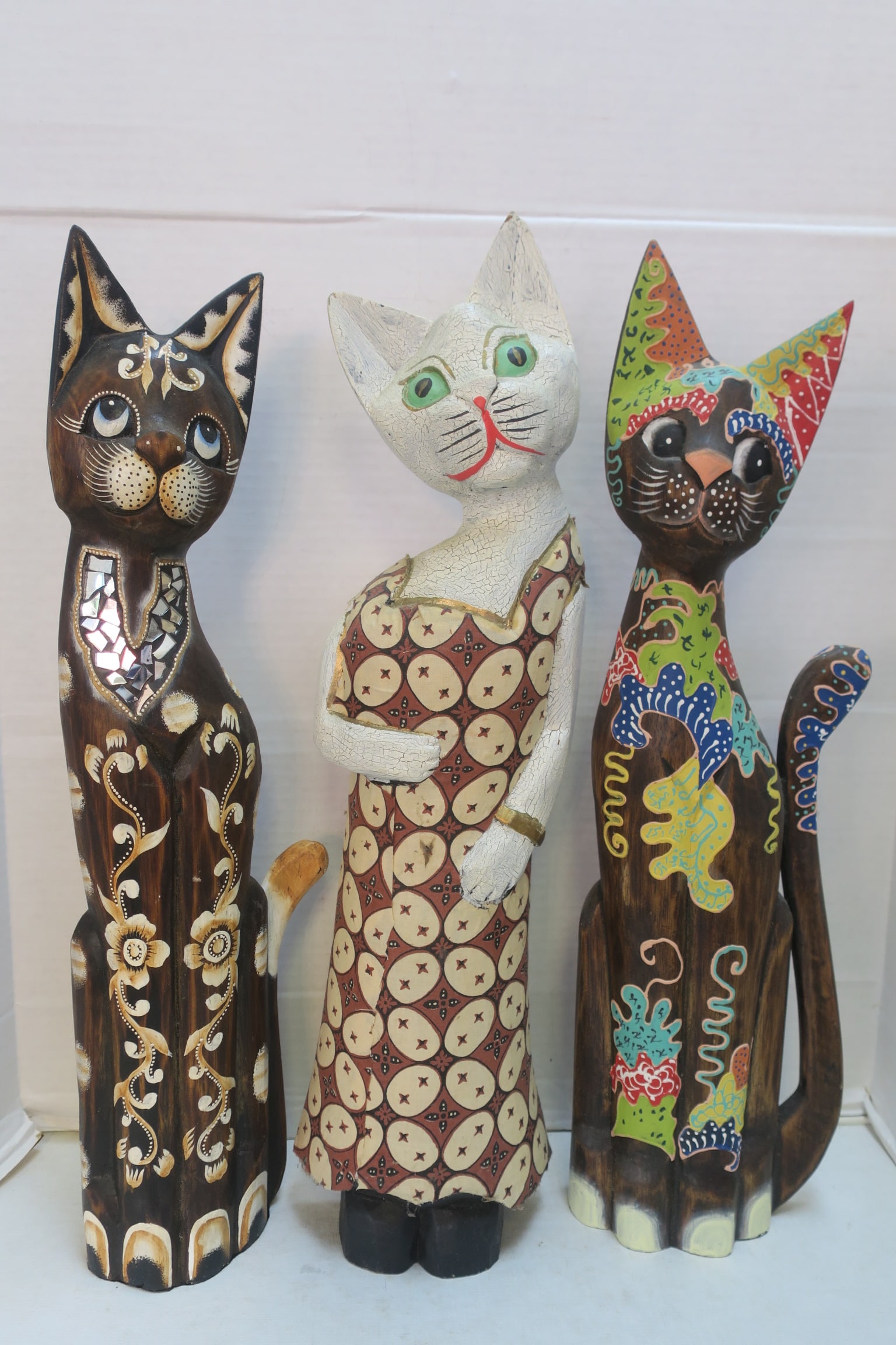 THREE FLAT BACK CARVED, PAINTED