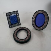 THREE FLORAL ENAMEL PHOTO FRAM