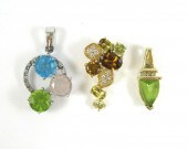THREE FOURTEEN KARAT GOLD PEND