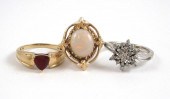 THREE FOURTEEN KARAT GOLD RING