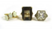 THREE FOURTEEN KARAT GOLD RING