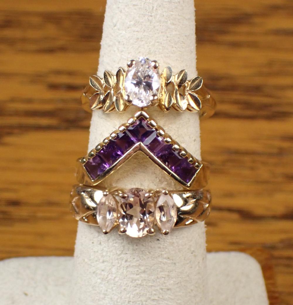THREE FOURTEEN KARAT YELLOW GOLD