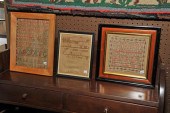THREE FRAMED SAMPLERS. Red and