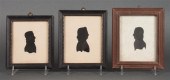 Three framed silhouettes of ''
