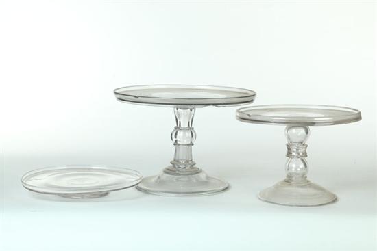 THREE FREE BLOWN GLASS SALVERS. 
