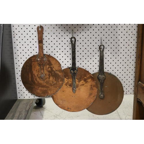 Three French copper lids, approx
