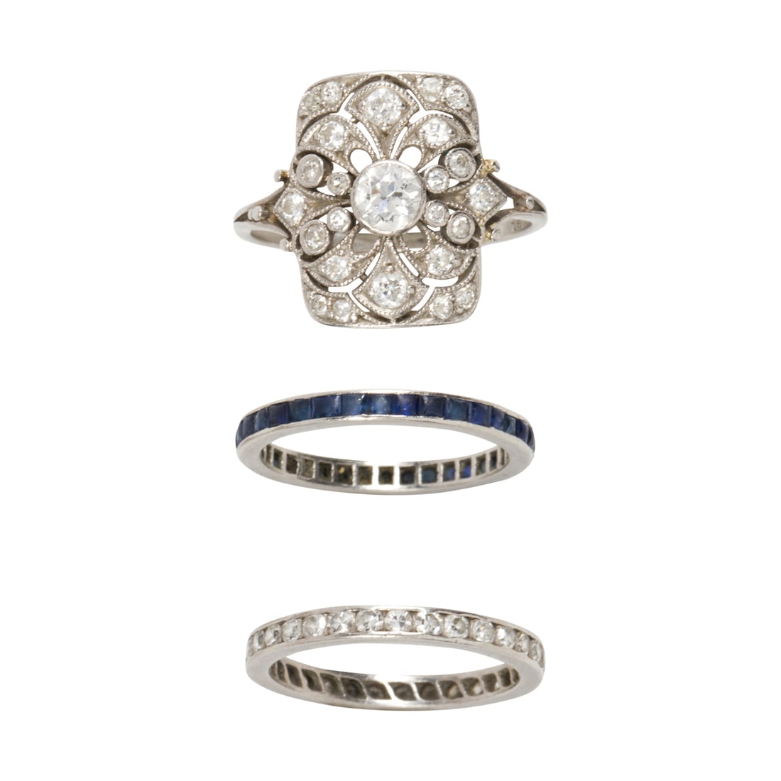 THREE GEM-SET AND PLATINUM