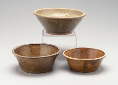 Three Georgia stoneware bowls,