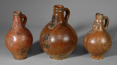 Three German Bellarmine jugs,