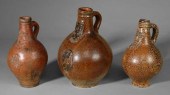 Three German Bellarmine jugs,