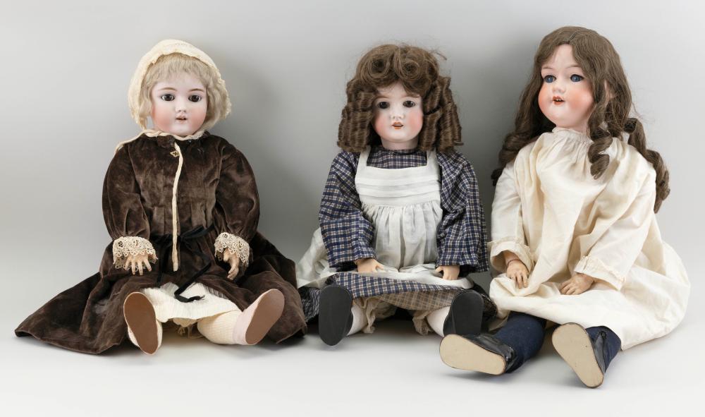 THREE GERMAN BISQUE-HEAD DOLLS