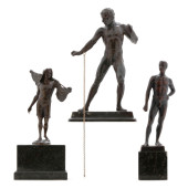 THREE GERMAN PATINATED METAL M