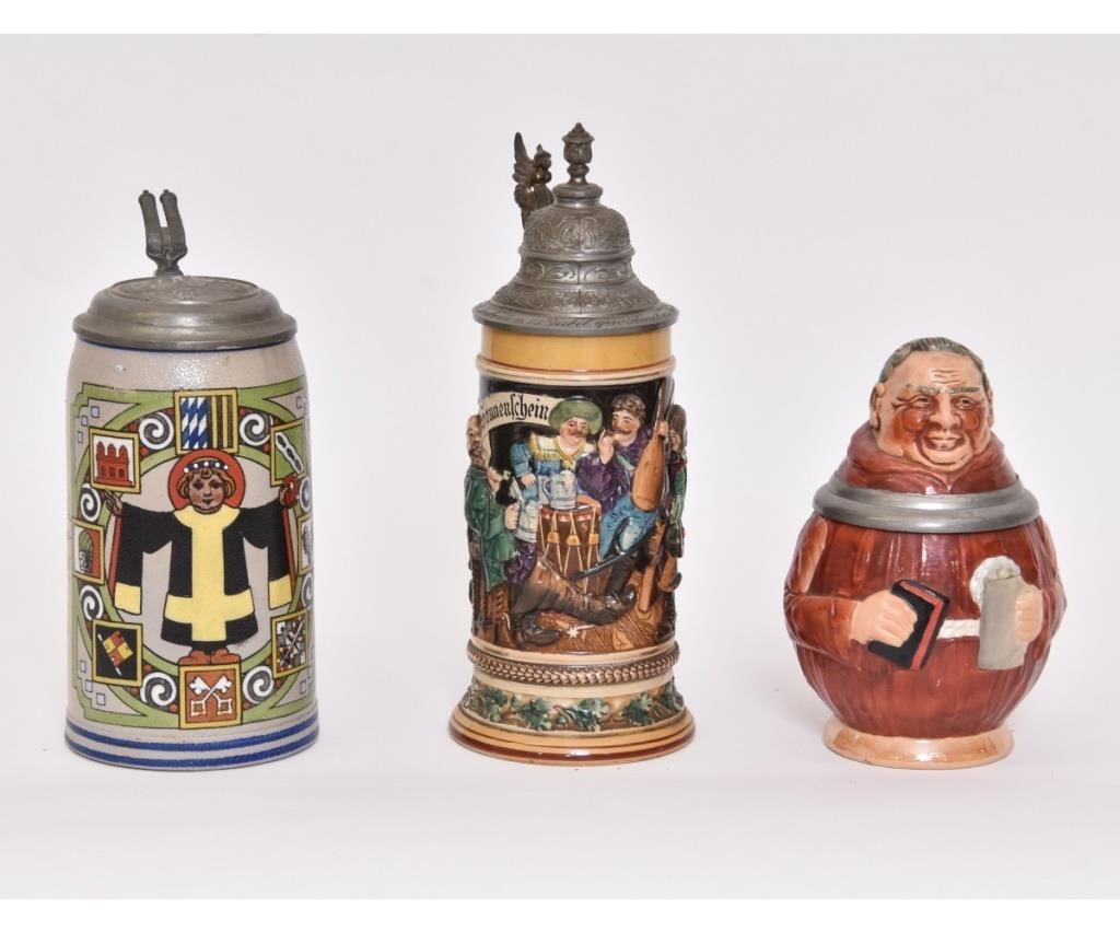 Three German steins, the largest