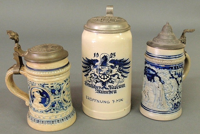 Three German steins with pewter