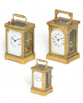 THREE GILT BRASS CARRIAGE CLOC