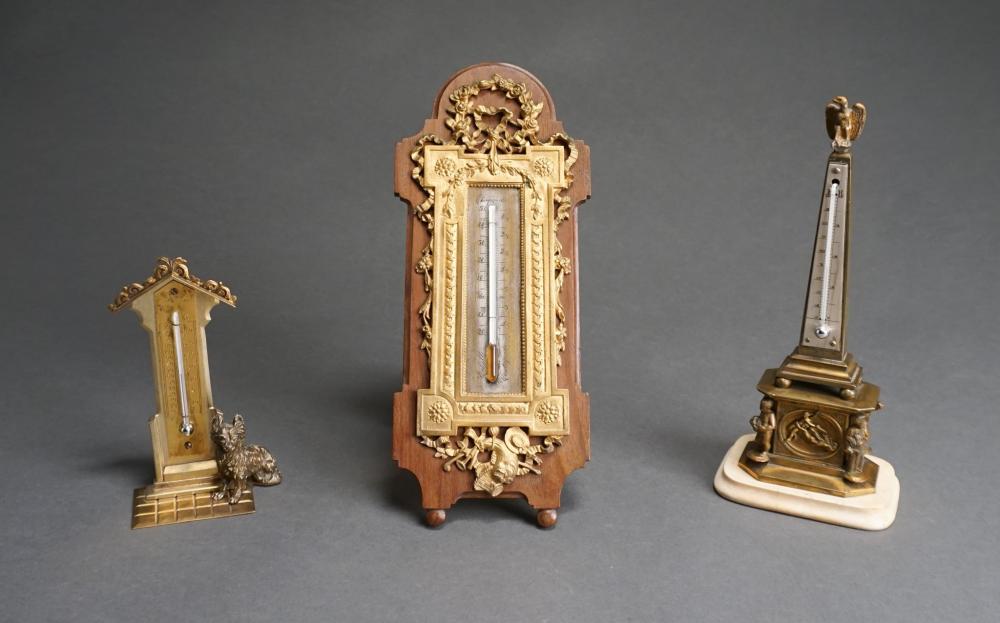THREE GILT BRONZE AND PATINATED