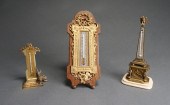 THREE GILT BRONZE AND PATINATE