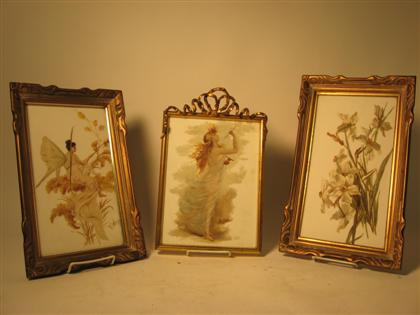 Three gilt framed painted porcelain