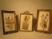 Three gilt framed painted porc