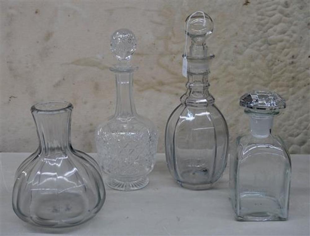 THREE GLASS DECANTERS AND A