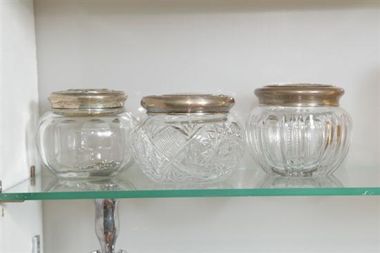 THREE GLASS DRESSER JARS WITH