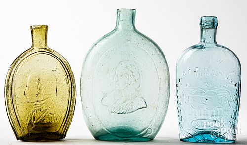 THREE GLASS FLASKSThree glass