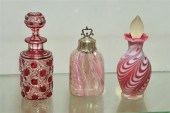 THREE GLASS PERFUME BOTTLES. I