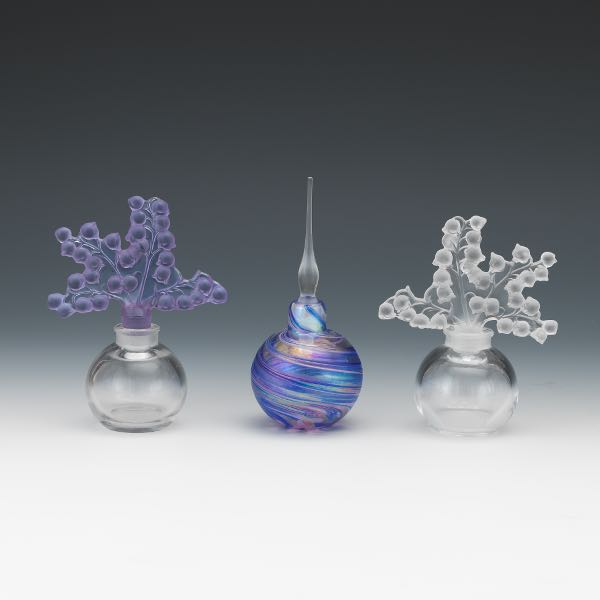 THREE GLASS PERFUME BOTTLES  Two