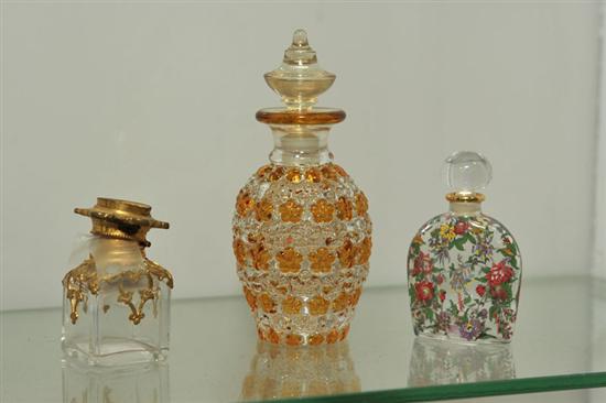 THREE GLASS PERFUMES. A clear and